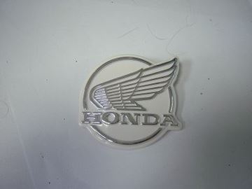 Picture of EMBLEM TOP COVER C50 TAYL